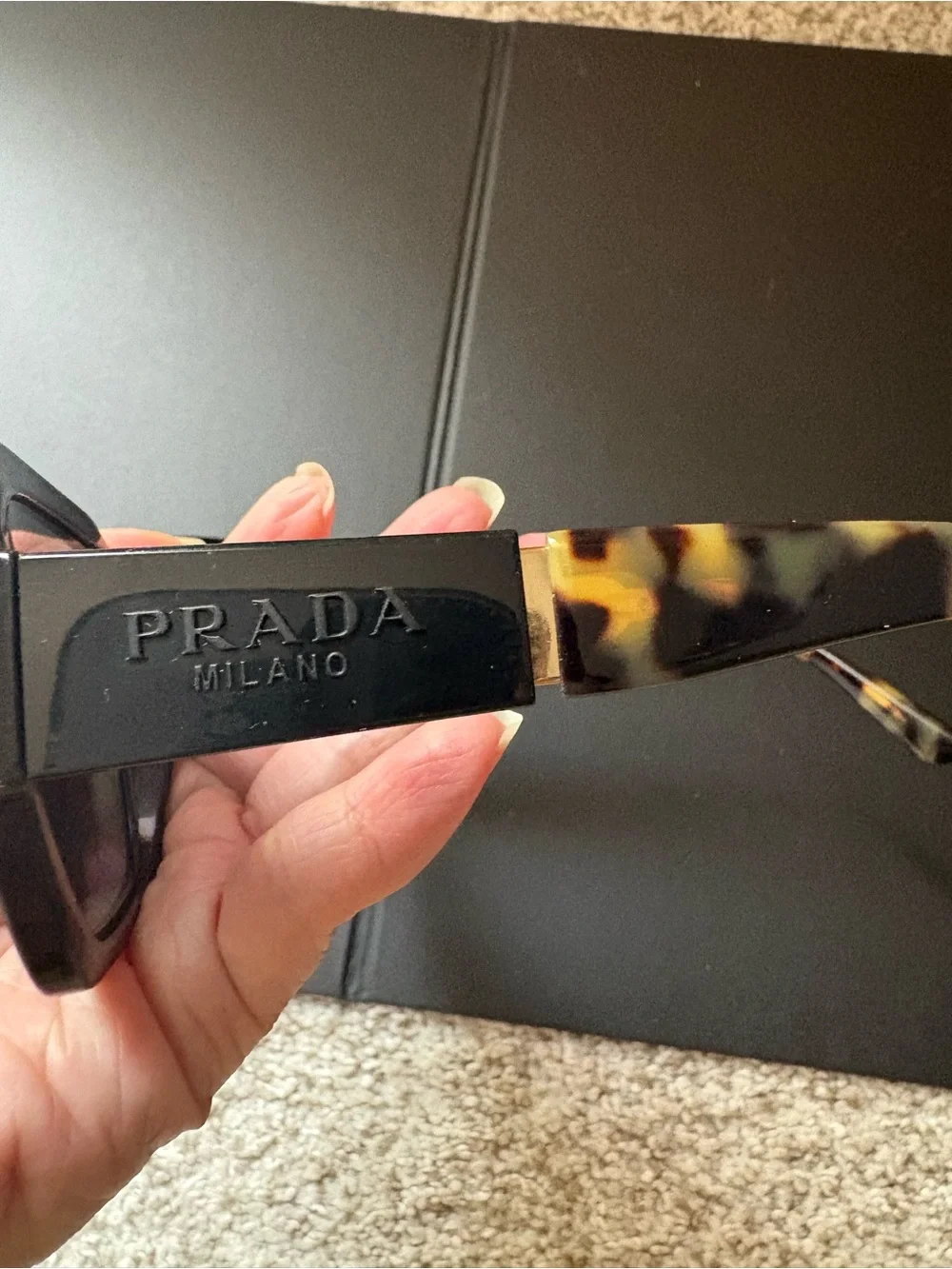 Prada Black Frame Sunglasses with Tortoiseshell Temples